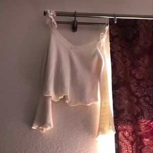 An almond white off the shoulder yarn top v neck
